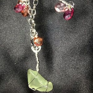 Chain necklace with stone pendant and charms